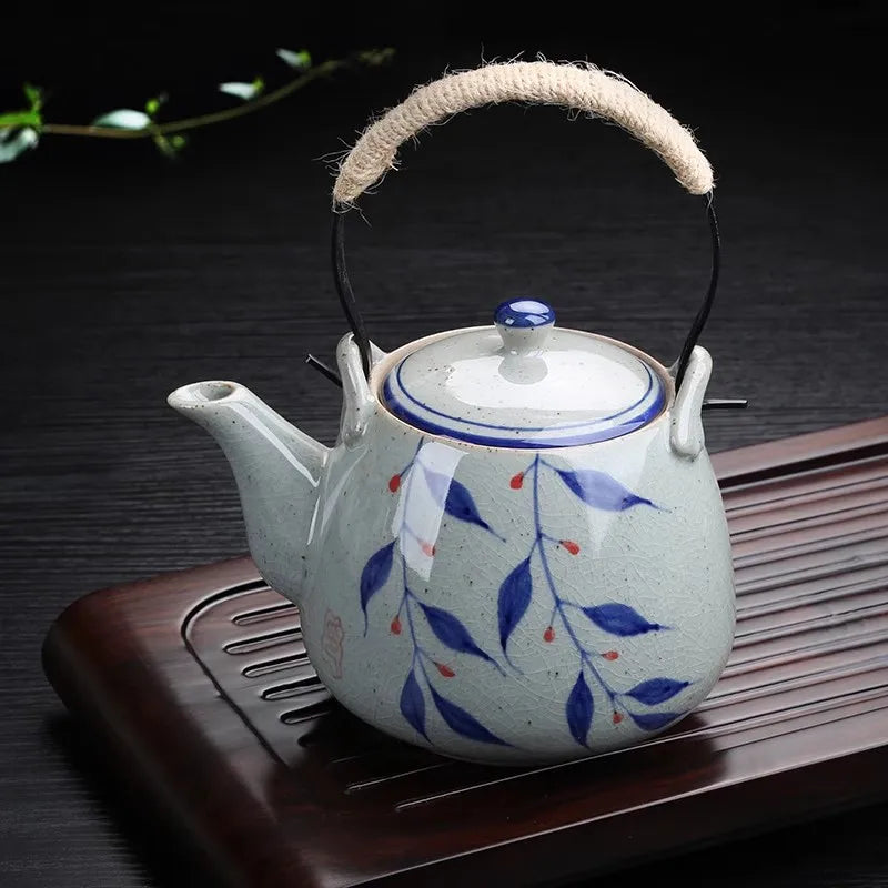 Théière 1L en Porcelaine sur un plateau 