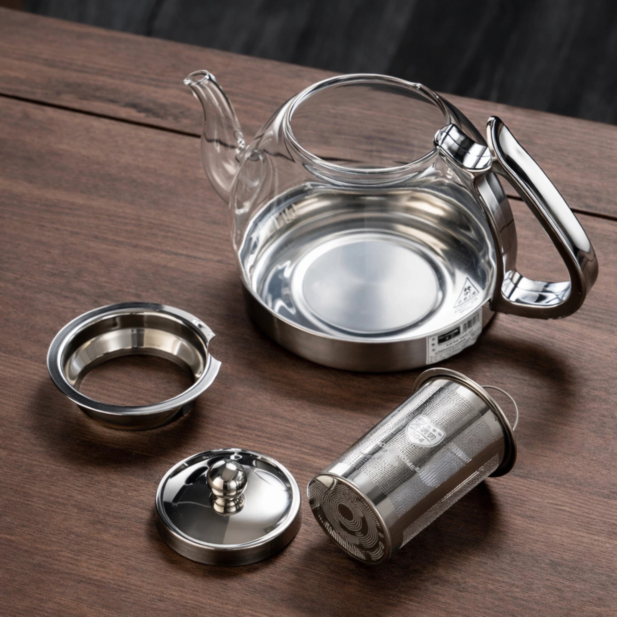 Théière Induction en Verre Transparent et les différents composants qui la compose, filtre, couvercle 
