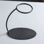 Théière Magnétique en Verre Noir vue sur le socle 