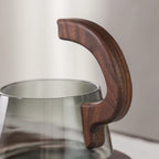 Théière Magnétique en Verre avec Tasse vue sur la poignée 