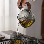 Théière Magnétique en Verre avec Tasse versant du thé 