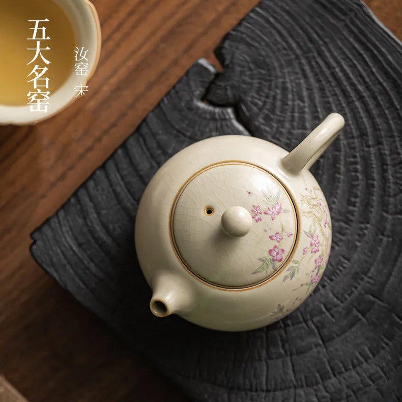 Théière Porcelaine Artisanale Fleurie avec une vue de haut 