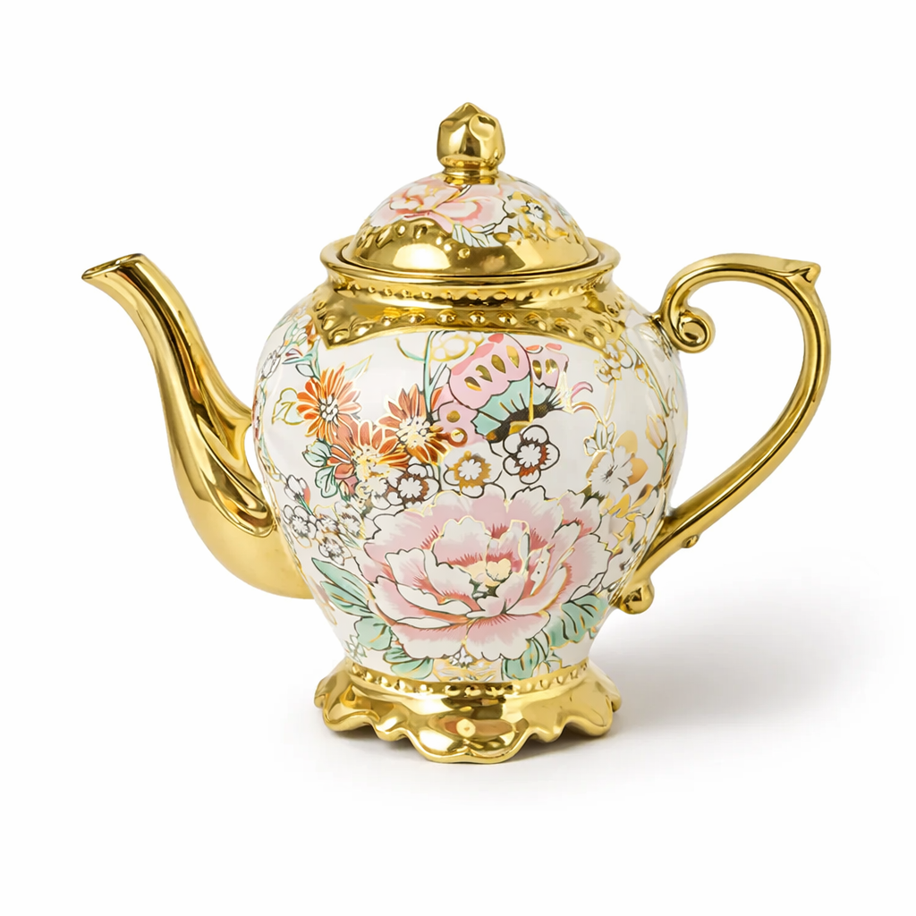 Théière Vintage en Céramique Dorée sur fond blanc 