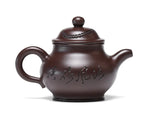 Théière Yixing Marron Artisanal sur fond blanc de l'autre coté 