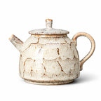 Théière en Céramique Beige sur fond blanc 