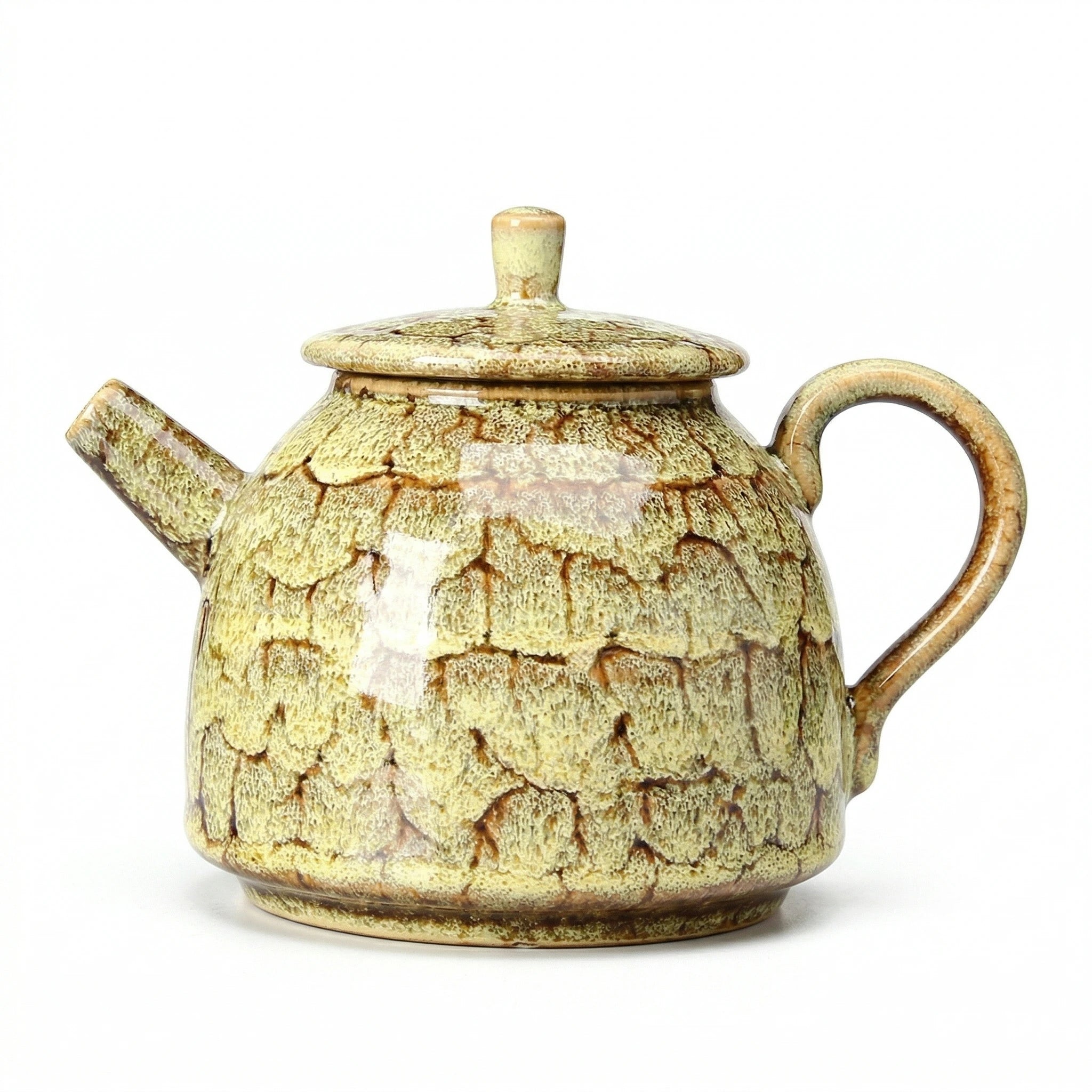 Théière en Céramique Jaune sur fond blanc 