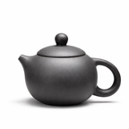 Théière en Terre Cuite de Yixing Ronde Noire sur fond blanc 