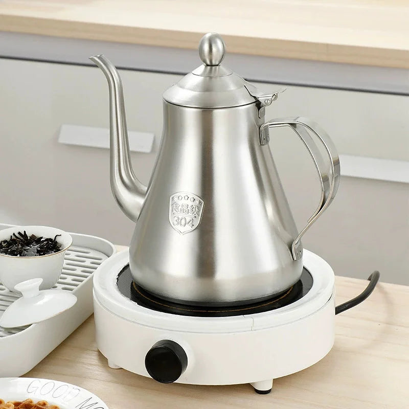 Théière induction en Acier Inoxydable sur une surface chaude 