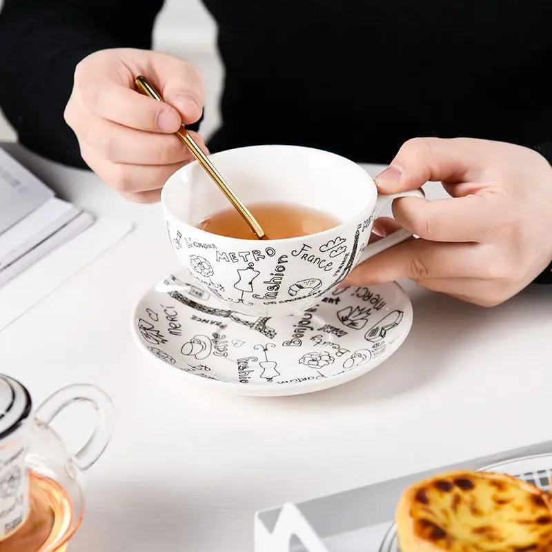 tasse de la théière solitaire en verre paris avec cuillère 