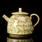 Théière en céramique jaune 